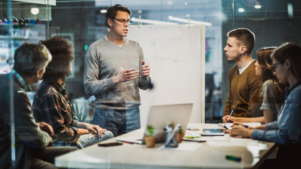 A group of people in discussion during a meeting