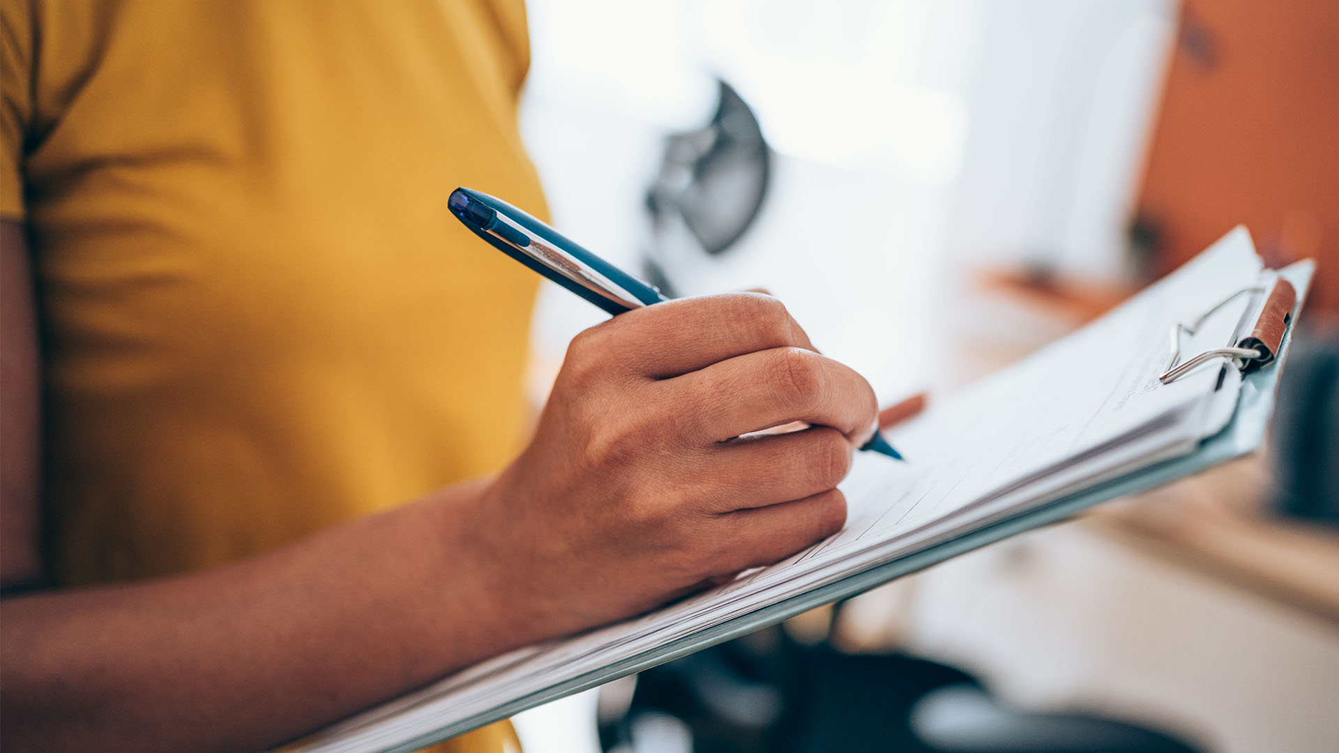 An employee going through a checklist.